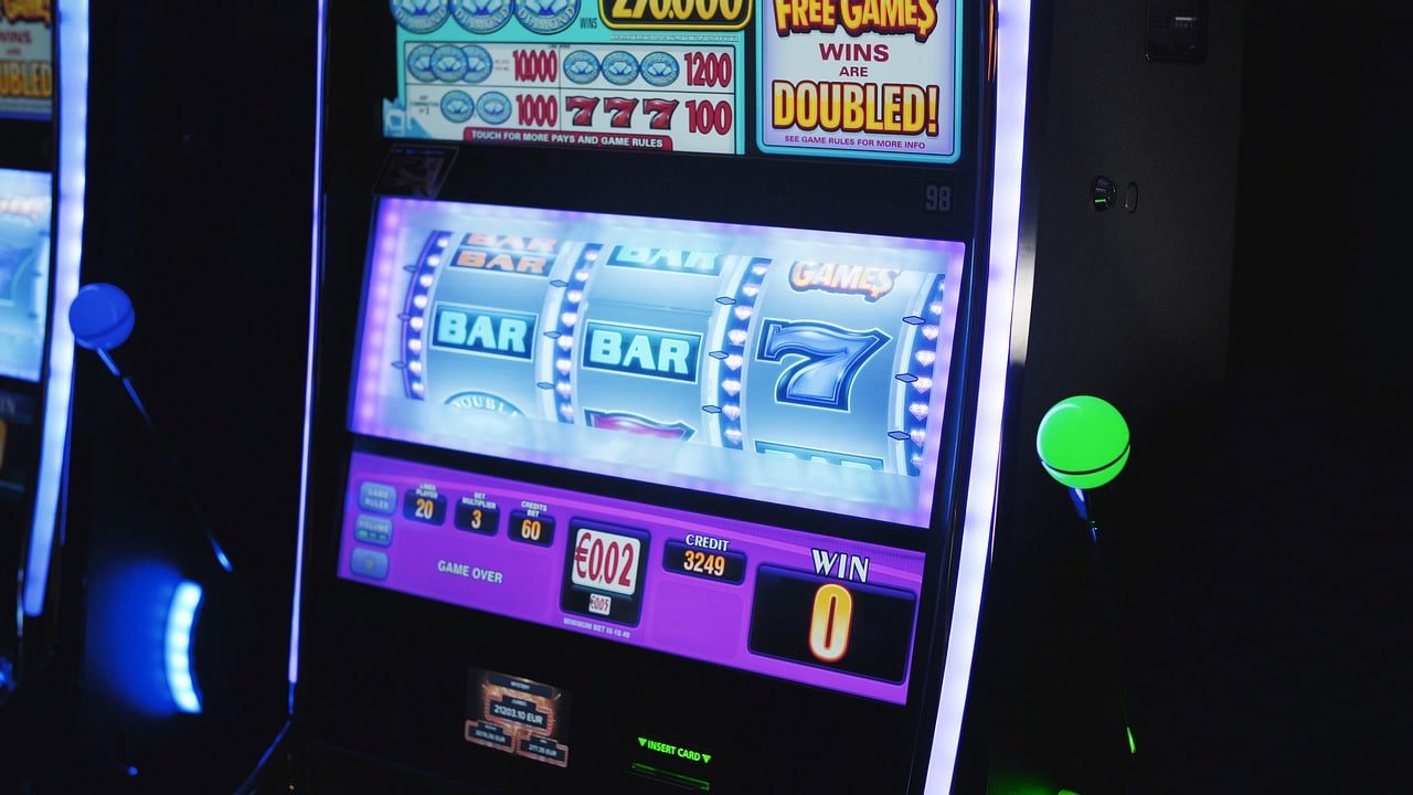 Filipino player using pko99 on a smartphone to access sports betting and slot games